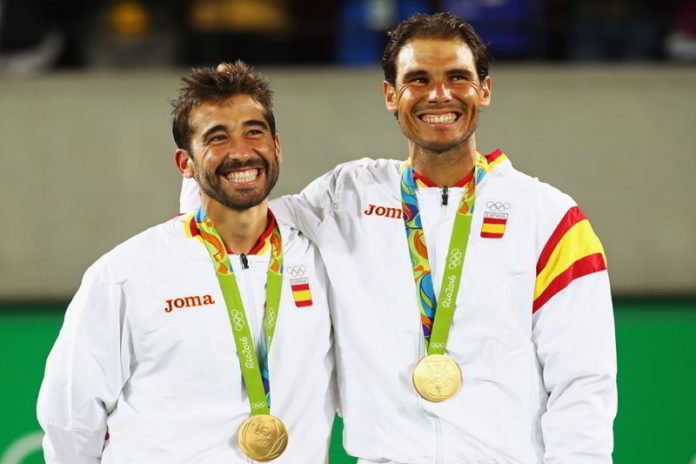 Medalla de oro en dobles Medalla de oro en dobles